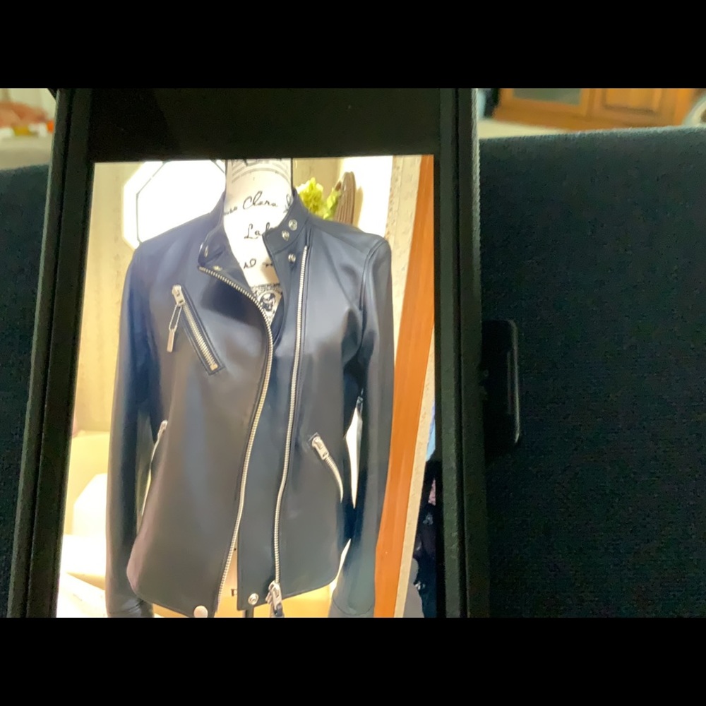 Ladies Coach leather jacket.